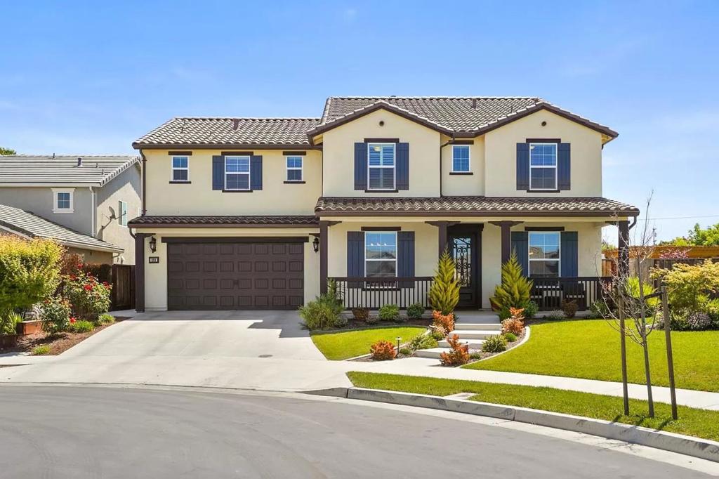 The stunning "Highly Sought" 4Bed/2.5bath 3,262 Sq.Ft. Scarlet Model Home by Century Communities Development ,Village at Santa Ana. From the magical entry door follow a series of endless first floor upgrades into a great room floorplan that encompass a gourmet kitchen, Island, and butler's pantry at the heart. Designer craft finishes lead you upstairs to an elaborate large bonus room converted in 2 bedrooms and 1 bathroom with no permits and continues through beautiful spacious bedrooms which include surround sound, custom built-in cabinetry, recessed lighting, specialty panel &crown molding, and walk-in closets. Embrace the rear yard paradise with a covered patio, large outdoor BBQ Island, an18 x 18 Custom Pergola, and meticulously landscaped backyard. Garage configuration features a 4 car tandem layout with an added rear roll-up door feature. Situated on a quiet cul-de-sac and within walking distance from the neighborhood parks, trails, and access to the best of its community amenities.