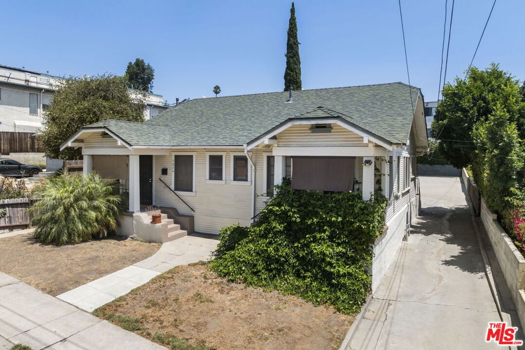 EAGLE ROCK - 4 Unit INVESTMENT PROPERTY! This exceptional multi-unit property consists of a front DUPLEX which features two large, side-by-side 1 bed / 1 bath - each over 900 sq ft - with in-unit laundry, plenty of closet space and more. 2nd building is a spacious 3 bed / 3 bath single-family residence, floor plan is ideal for a future owner-user, shared living, or maximizing rental potential with multiple entrances at front and back of home + laundry area & BONUS SPACE. Above this home is a separate, studio-style unit with an open-concept layout and elevated views. All of this is just steps from Local Restaurants, Coffee shops, Target & more. Whether you're an investor seeking strong returns or a buyer looking for flexible living options, this property offers exceptional value and versatility in one of Los Angeles' premier neighborhoods.