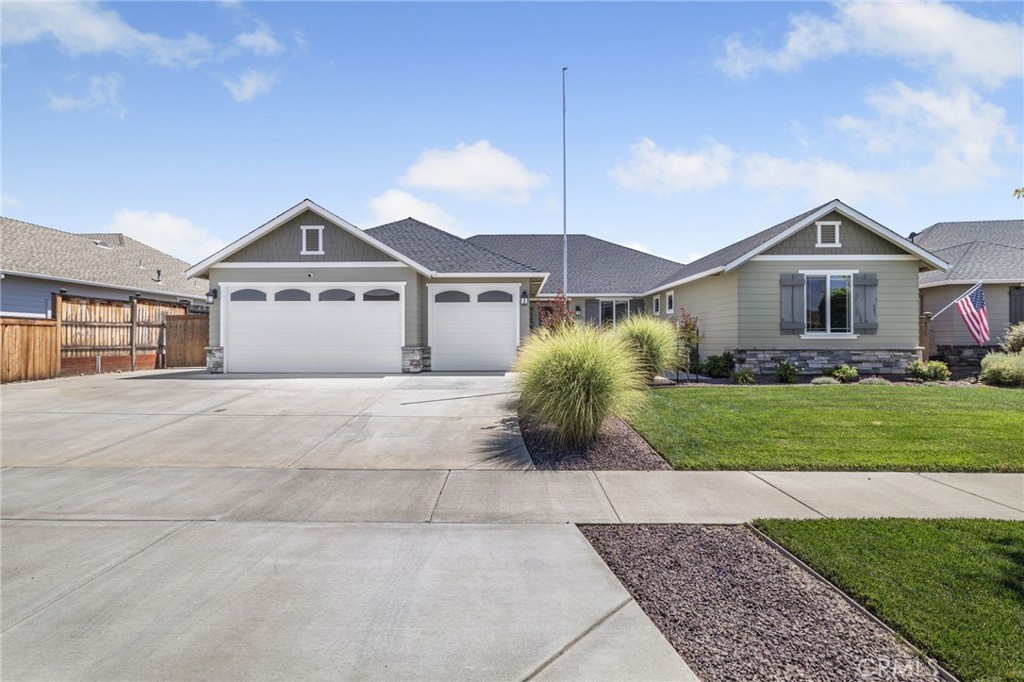 Step into upscale living in one of Chico’s premier neighborhoods with this stunning Epick built home. From the moment you arrive, the curb appeal and oversized driveway with dedicated RV parking for your boat or trailer set the tone. Inside, you’ll find four spacious bedrooms and two-and-a-half baths, including primary suite with dual closets, a deep soaking tub, and a walk-in shower. The gourmet kitchen includes a generous island with bar seating, quartz countertops, stainless-steel appliances, and abundant storage. OWNED solar panels ensure eco-friendly, budget-smart energy savings year-round. The home is beautiful, but wait until you step outside to the fully covered back patio—complete with four ceiling fans, lighting, and space to relax or entertain friends and family, even on the hottest summer days. The expansive yard offers plenty of room for lawn games or a future pool, while raised garden beds invite you to grow fresh produce or flowers. And the location couldn’t be better: you’re just north of Chico’s Bidwell Park and steps from the neighborhood walking path. Hancock Park is only a few blocks away—ideal for families or evening strolls. Come see why 3140 Rae Creek Drive will make you say, "Yes to the Address!"