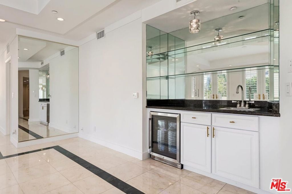 121 N Almont Drive 205