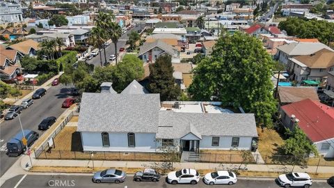 Photo of 3425 W 15th Street, Los Angeles, CA 90019 (MLS # SB25155798)