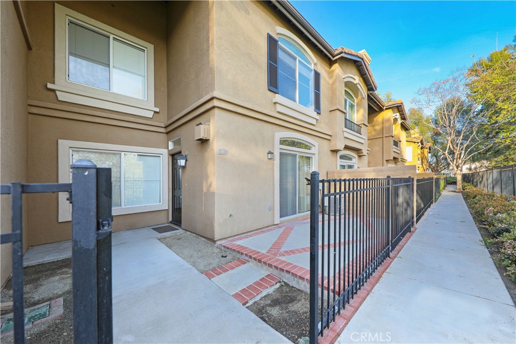 Welcome to the highly desirable Passeggio community! This charming townhome offers a bright and airy 1,162 sq. ft. floor plan with 2 bedrooms, 2.5 bathrooms, and a convenient 2-car attached garage.
Freshly presented in clean, move-in condition, the home features neutral paint, a mix of carpet, tile, and wood flooring, and mirrored sliding closet doors in the bedrooms. The private, enclosed patio off the living room creates a perfect space to relax or entertain, while the peaceful location ensures no road noise.
Just a short walk brings you to Westridge Community Park, and the home is ideally situated near Canyon Vista Elementary School, shopping, dining, and with easy access to the 73 Toll Road.
