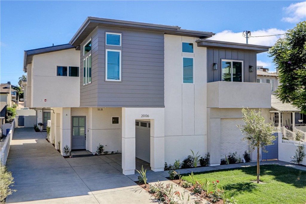 Experience the best of new construction and coastal living at this brand-new, detached front-unit townhome—designed to feel like a private single-family home with over 2,500 square feet of modern, light-filled living space and a rare, spacious backyard.
Inside, clean lines and thoughtful details create a seamless blend of comfort and sophistication. The heart of the home centers around an open-concept living and dining space, anchored by a Touchstone Smart WiFi-enabled electric fireplace and a striking chef’s kitchen. The kitchen pairs sustainable, durable Innocraft cabinetry with a luxe Thermador appliance package, a double waterfall-edge island, and a custom dry bar with ambient lighting and wine display—designed as much for entertaining as everyday ease. The entire lower level enjoys peaceful views of the backyard entertaining space.
Upstairs, all four bedrooms, a loft-style secondary living room (or optional office area), and a full laundry room keep daily life organized and connected. The primary suite feels like a private retreat, featuring a custom-designed luxury closet and a spa-inspired bathroom with a floating soaking tub, bonus seated vanity, shower with bench seating, built-in pocket shelving, and designer lighting. Every bedroom includes its own built-in custom closet system.
Practicality meets comfort with solar panels (owned and paid), central A/C, a central vacuum system, upper-level linen storage, and a two-car garage with epoxy floors, bonus storage racks, quiet-close opener, utility sink hookup, and direct yard access. The private backyard offers plenty of space to relax, entertain, or play—something rarely found with new townhomes.
Located in the heart of North Redondo Beach, this home is zoned for Jefferson Elementary, Parras Middle School, and Redondo Union High, and offers quick access to local parks, dining, and the beach.
