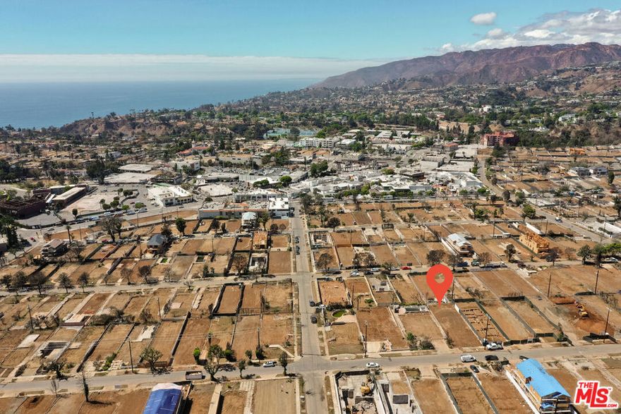 An amazing opportunity to be a part of the Palisades rebuild in the heart of the Alphabet Streets. Set just three blocks from the Palisades Village, this 5,197 sq. ft. flat parcel is fully cleared and shovel-ready. Build your dream home with unparalleled access to top-rated schools, beaches, scenic hiking trails, and world-class shopping and dining -  all just moments away.  Trust Sale  property sold as-is. Seller will begin reviewing offers on October 7, 2025. Buyer to verify all rebuild feasibility, permits, utilities, and lot lines with the City of Los Angeles and appropriate agencies. This is a land listing only.