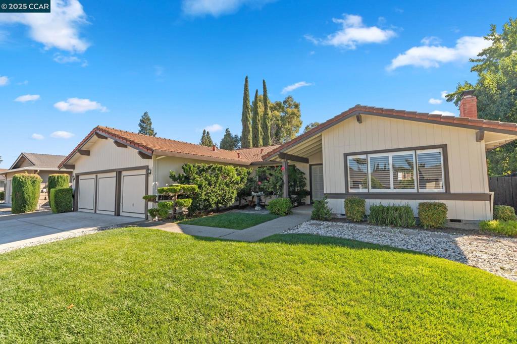 Welcome to your new oasis! This beautiful 4-bedroom, 2.5-bathroom home with spacious 3 car garage with a sparkling swimming pool is a true gem, offering a perfect blend of comfort and style. Step inside and you'll find a freshly painted interior with a spacious, open layout. The seamless flow from the large kitchen to the dining and family rooms makes it an ideal space for entertaining. You'll love the generous primary suite with its pitched ceiling and walk-in closet, while the three additional bedrooms offer plenty of room for family or guests. Outside, your private backyard retreat awaits with a sparkling pool, covered patio, and mature trees—perfect for relaxing or hosting summer get-togethers. With RV/boat parking and a prime location close to great schools, shopping, and parks, this home truly has it all.