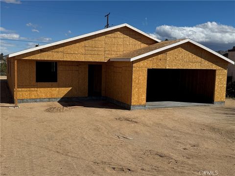 Photo of 6013 Encelia Drive, 29 Palms, CA 92277 (MLS # CV26017015)