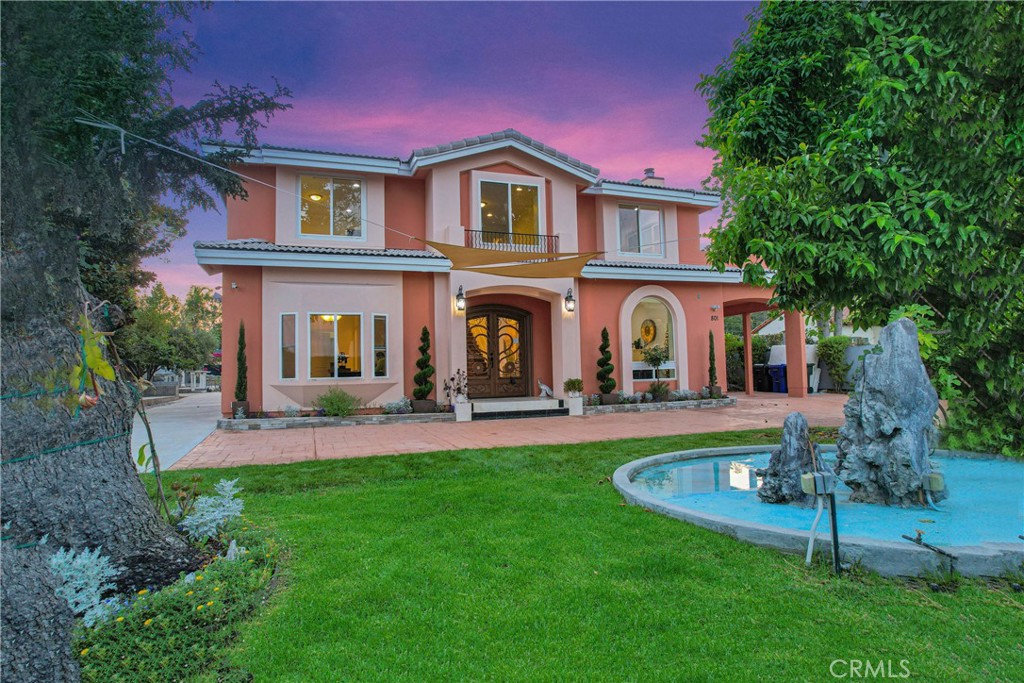 Discover the pinnacle of bespoke living at this remarkable Pasadena residence, where every detail was meticulously planned and executed. Built from the ground up as a cherished dream home, this property features the finest materials, ensuring a legacy of quality and peace of mind.
Step inside to an interior that is a testament to custom design and luxury. The expansive open floor plan flows seamlessly under grand, high ceilings, creating an immediate sense of volume and airiness, while an abundance of natural light streams in through numerous custom-ordered skylights. Uniquely, these skylights are openable, allowing for refreshing cross-ventilation when desired. Further enhancing the home's comfort, the energy-saving roof is fitted with special custom UV-reflecting tiles, significantly reducing the need for constant air conditioning. With positive Feng Shui as a foundational element of its architecture, the home exudes a palpable sense of harmony, balance, and well-being.
The exterior is just as impressive. Gaze upon stunning mountain views from your own private oasis. The property is frequently graced by visits from majestic local peacocks, considered auspicious creatures, whose beauty can be admired amidst the tranquil, park-like surroundings. The meticulously designed backyard is an entertainer's delight, where a spa-like waterfall fountain with lively koi fish provides a relaxing focal point for gatherings. This expansive space also features a versatile game room and offers immense potential for future enhancements. A detached 4-car garage presents an incredible opportunity for an easy conversion into a spacious Accessory Dwelling Unit (ADU), complete with its own separate entrance to ensure convenience and privacy.
Perfectly situated, offers a rare combination of tranquil seclusion and unparalleled convenience. You are just minutes from world-class destinations, including the shopping at Santa Anita Mall, the historic Santa Anita racetrack, the natural splendor of the LA County Arboretum, the renowned Huntington Library, and Caltech. Daily living is effortless with premier supermarkets like H Mart, Trader Joe's, and Whole Foods nearby, along with an array of celebrated restaurants. Proximity to the new USC Arcadia Hospital adds significant value and peace of mind, all while being tucked away from the noise of main thoroughfares.
This exquisite estate is more than a home; it is a carefully crafted masterpiece awaiting its next discerning owner.