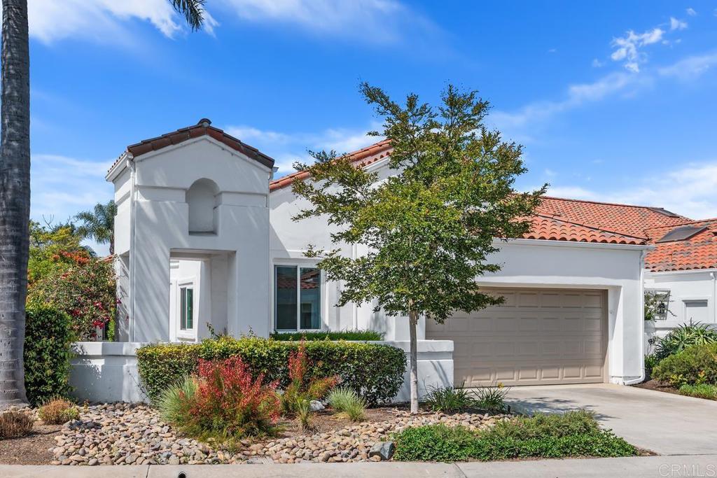 Welcome to Ocean Hills Country Club-a premier, 55+ community in North San Diego County. This detached, single level, 1850 sq ft Corinth Model has "Dual Master Suites" plus an optional 3rd bedroom/den, 3 full baths! Features incl: vaulted ceilings, formal entry, gas fireplace in living room, full size dining room, sunny kitchen with eat in breakfast area, dual-paned windows and slider, plantation shutters and convenient inside laundry room. The kitchen has newer, honey-colored wood cabinetry and granite counters. This home is ready for you to make it your own. Are you looking for the perfect community for a second home or to make your own retirement dreams come true? An internationally acclaimed 55+ community for active adults, OCEAN HILLS COUNTRY CLUB has only gotten better with each year. This hilltop enclave has controlled access & tons of the finest amenities! Included in HOA fees are a 27,000 s.f. clubhouse with library, cardio and weight rooms, even kitchen facilities that you can reserve for personal catered events. Over 1600 Mediterranean style homes, with 17models, are clustered around an 18 hole executive-style golf course with no green fees. Residents enjoy an heated, salt water, swimming pool & spa, lighted tennis & paddle tennis courts, bocce ball courts, billiards & RV storage. There are approximately 40-50 social clubs and classes offering a wide range of activities such as dance, art, photo, computer, card games, travel, sailing, pickle ball or RV excursions. Many residents enjoy the walking path, hiking, bicycling & dog park. INCLUDED IN HOA FEES are front yard maintenance/ landscaping, exterior house painting/roof maintenance as well as all amenities.