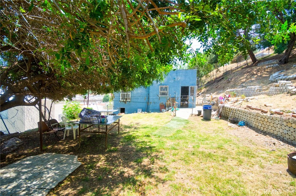 Welcome to 2602 Onyx Drive, a hidden gem perched in the hillside community of one of Northeast LA’s most desirable and up-and-coming neighborhoods. Great opportunity to own a 2-bedroom, 1-bath home on a generous 6,713 sq ft lot located in the sought-after 90032 ZIP code. Built in 1925, this property has a unique chance for renovation and customization. Whether you're a buyer, investor or developer, the spacious lot provides excellent potential to expand the existing structure or creating a custom space. The home is situated in close proximity to Dodger Stadium, the heart of Downtown LA, local eateries, schools, and major freeways. Close to local hotspots like Ernest E. Debs Park, Hermon Dog Park, and neighborhood favorites in Lincoln Heights. This location has urban convenience and hillside tranquility. Public transit options are also nearby and convenient access to all of Los Angeles. This is a rare opportunity to build equity and add value in a central, growing neighborhood. Bring your vision and feel the breeze. Don’t miss this opportunity!