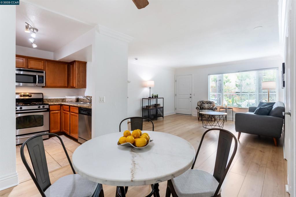 Rarely available, highly desired 2 bed 2 bath condo, in the Entourage building, in the heart of the Media District. Brand new flooring and fresh paint elevate this already upgraded dual-en suite first floor corner unit. Has central AC and heat via a new HVAC installed last year. Also features walk-in closets, dual-pane windows, 2 dedicated parking spaces and assigned storage. Entourage amenities include a hot tub, gym, BBQ, outdoor gathering spaces, and laundry all with a low HOA. In-unit laundry installation is a possibility with HOA approval. Central location is in the heart of Burbank, minutes from Magnolia Park and downtown. Toluca Lake is just a few blocks away and unit is only one block away from Starbucks, Handels, Vons, and so many more restaurants and stores. Location, location, location!