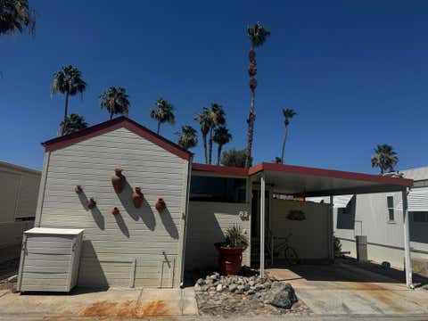 Photo of 84136 Ave 44 #83, Indio, CA 92203 (MLS # 219148160DA)