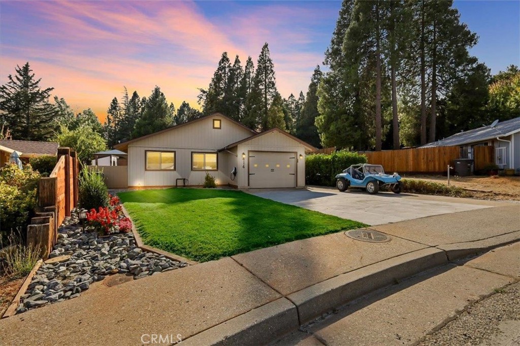 Looking for the perfect blend of country living & modern convenience? 414 Lamarque Ct in Grass Valley offers just that! Charming 1,058 sq. ft. single-story home features 3 bd 1 ba & 1-car garage. It boasts a spacious driveway & additional parking, adding both curb appeal & convenience. Gravel beds in the front offer low-maintenance landscaping. Inside the living room/dining combo with a sliding door to yard, create a bright open feel. Kitchen with ample cabinetry & pantry closet, ideal for extra storage. Bedrooms are generously sized, providing comfort and versatility for family or guests. The backyard offers plenty of space to create your dream outdoor retreat, whether for entertaining, gardening or to Enjoy the outdoor spa and gazebo perfect for relaxation. Transferable solar system for energy efficiency, Ideally located w/easy access to Hwy 20 & 49. Close drive to Nevada City, Penn Valley & Lake Wildwood. Don't miss the chance to make this inviting property your starter or forever home!