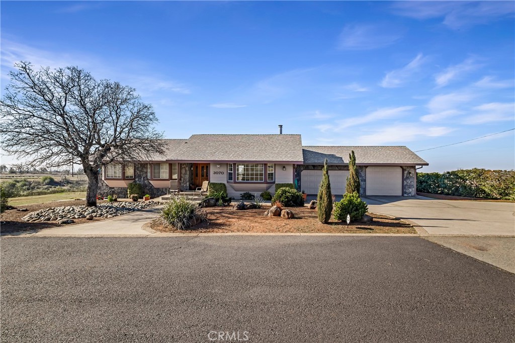 Fantastic Lower Paradise Location for this 15 ACRE property. VIEWS of Chico, Sutter Buttes and the Coastal Mountain Range! Have amazing views every day! Looking for space then this is it! Tons of flat area for a SHOP, ADU or both! This 1990 built home offers 3 bedrooms plus office, 2 baths, 3 car garage with 1/2 bath and third bay garage door being extra tall! There is also an in-ground POOL with incredible views!!! New interior paint, Mannington laminate flooring, Marquis carpet with #8 Pad, bathroom faucets, toilets, garage, kitchen and security lights, GE range, LG front load washer and dryer, Pool Pump, booster pump, filter and safety drains, chimney cleaned, and spark screen replaced. The home offers a large living room with vaulted knotty pine tongue & groove ceiling, bay picture window and a floor to ceiling rock hearth with a free-standing Schrader Wood Stove. Off the living room is the dining area & kitchen. The kitchen offers tons of cabinets, solid surface counter tops, breakfast nook, 7' eating bar and tiled floors. Down the hallway are built in cabinets, spacious guest bedrooms and the office. The primary bedroom has vaulted knotty pine tongue & groove ceilings, views of the valley and a slider to the back deck. The primary bath has dual sink vanity with tiled counters and a tiled step in shower. The guest bath offers tiled counters and a tiled tub/shower combination. There is a cummings back up generator system. The well has a 1000 gallon holding tank. The home is on 9.89 acres and this property is including another undeveloped separate 5 acre property that runs on the south property line. Very close commute to Chico! Landscape in front and back yard. One Year Home Warranty for the next 14 months transferable. This property is ready for a new owner. Video link https://vimeo.com/1058227001?share=copy.
