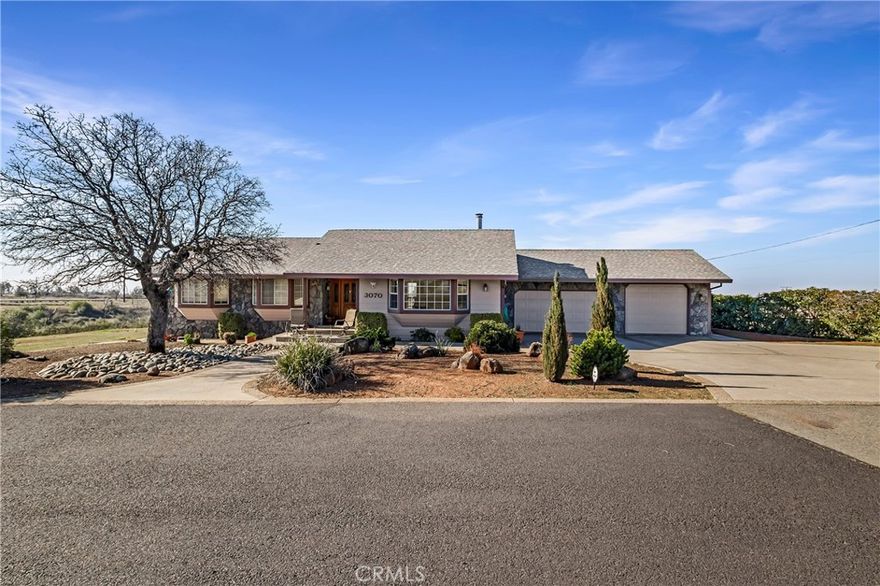 Fantastic Lower Paradise Location for this 15 ACRE property. VIEWS of Chico, Sutter Buttes and the Coastal Mountain Range! Have amazing views every day! Looking for space then this is it! Tons of flat area for a SHOP, ADU or both! This 1990 built home offers 3 bedrooms plus office, 2 baths, 3 car garage with 1/2 bath and third bay garage door being extra tall! There is also an in-ground POOL with incredible views!!! New interior paint, Mannington laminate flooring, Marquis carpet with #8 Pad, bathroom faucets, toilets, garage, kitchen and security lights, GE range, LG front load washer and dryer, Pool Pump, booster pump, filter and safety drains, chimney cleaned, and spark screen replaced.  The home offers a large living room with vaulted knotty pine tongue & groove ceiling, bay picture window and a floor to ceiling rock hearth with a free-standing Schrader Wood Stove. Off the living room is the dining area & kitchen. The kitchen offers tons of cabinets, solid surface counter tops, breakfast nook, 7' eating bar and tiled floors. Down the hallway are built in cabinets, spacious guest bedrooms and the office. The primary bedroom has vaulted knotty pine tongue & groove ceilings, views of the valley and a slider to the back deck. The primary bath has dual sink vanity with tiled counters and a tiled step in shower. The guest bath offers tiled counters and a tiled tub/shower combination. There is a cummings back up generator system. The well has a 1000 gallon holding tank. The home is on 9.89 acres and this property is including another undeveloped separate 5 acre property that runs on the south property line. Very close commute to Chico! Landscape in front and back yard. One Year Home Warranty for the next 14 months transferable. This property is ready for a new owner. Video link https://vimeo.com/1058227001?share=copy.