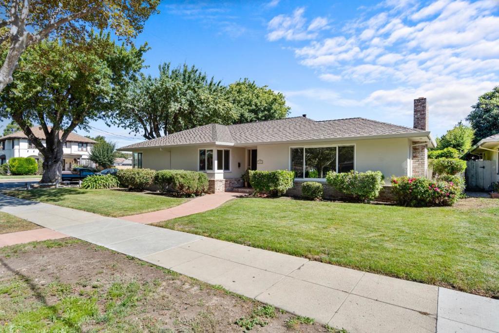 Beautifully maintained one owner home on a corner lot with ample parking. The home has a newer 50 year dimensional composition roof, several new windows, new kitchen counters, new inside and outside paint, new electrical and plumbing fixtures, new vinyl plank flooring in the kitchen and immaculately restored hardwood floors through-out the majority of the home. The home is very easily accessible to the downtown, schools and other public facilities. Vacant and easy to show.