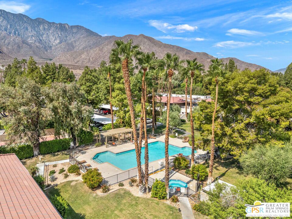 Welcome to 575 N Villa Ct #204, a turnkey furnished one-bedroom retreat where style and value come together. Move in or rent it out right away with peace of mind knowing it comes with a clear termite report, home inspection, and disclosures ready for you to review. The open layout feels bright and inviting, with a mirrored wall and west-facing windows showcasing mountain sunsets and striking northwestern views of the desert and windmills. The kitchen features granite counters and wood cabinetry, while tile floors throughout make for easy care. Step onto your private balcony to take in views of the pool, lush landscaping, and the dramatic Palm Springs horizon. Palm Springs Villas I surrounds you with resort-style amenities, including five sparkling pools, multiple spas, tennis courts, shuffleboard, BBQ areas, and beautifully maintained grounds. With fee simple land ownership and being sold fully furnished, this condo is ready for you to start enjoying right away. Whether you want a weekend escape, a seasonal retreat, or a smart income property, this home delivers comfort, convenience, and the Palm Springs lifestyle at an unbeatable value.