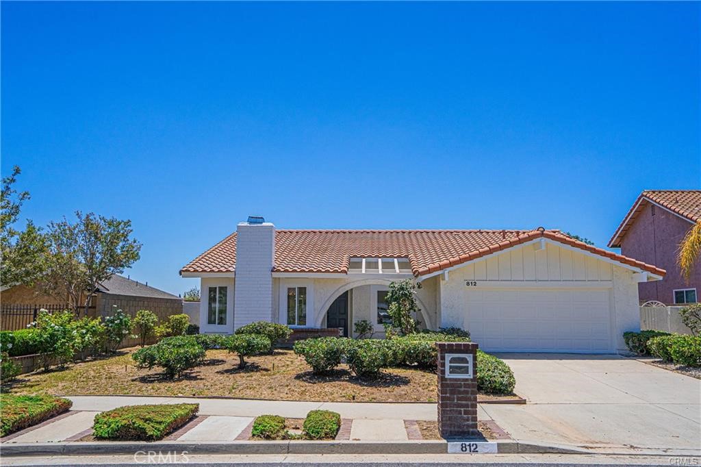 Welcome to this charming single-story home in one of Placentia’s most desirable neighborhoods! This beautifully maintained residence boasts an updated kitchen with stylish cabinets and granite countertops, two well-appointed bathrooms—one with a relaxing tub and the primary with a refreshing shower—plus soaring ceilings and a cozy fireplace in the main living area.
The open kitchen seamlessly connects to the dining area and extended living room, while sliding glass doors provide direct access to the manicured backyard, perfect for outdoor enjoyment. All three bedrooms and two bathrooms are thoughtfully arranged on one convenient level, offering comfort and ease of living.
Ideally situated in a quiet neighborhood just minutes from shopping, dining, and with easy freeway access, this home offers the perfect balance of suburban tranquility and everyday convenience. Don’t miss the opportunity to make this beautiful property your next home!
