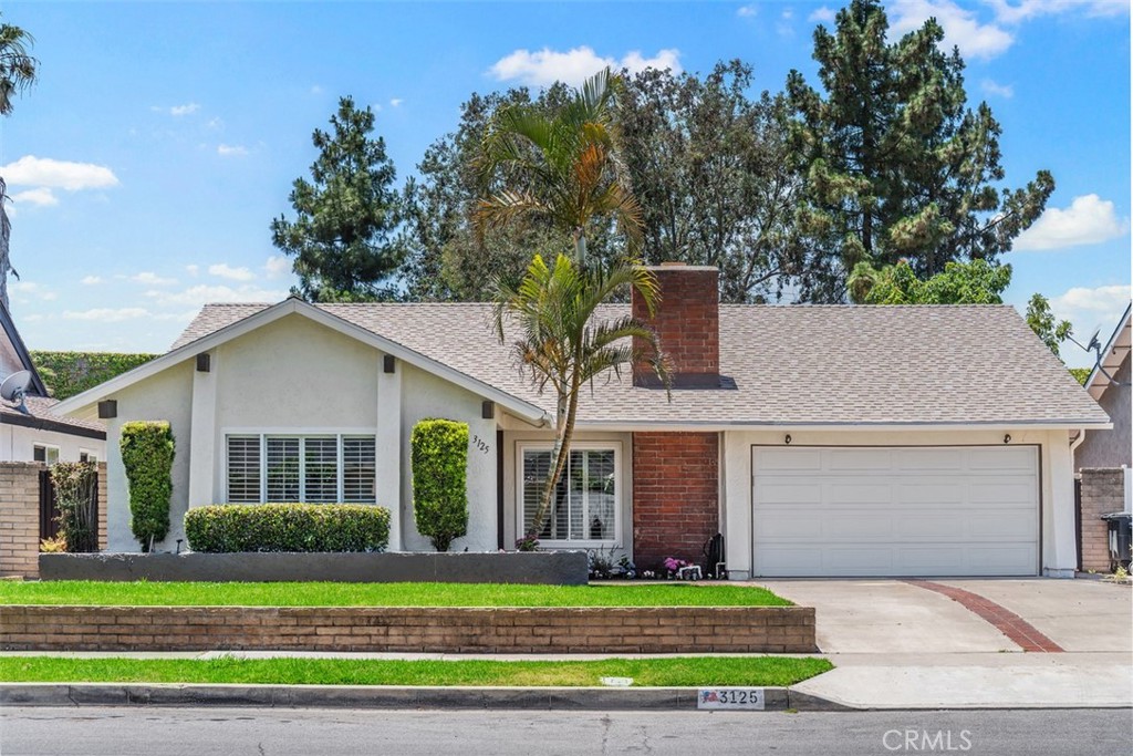 Stylish, Spacious & Single-Level Living in South Coast Metro
Welcome to 3125 Yukon Avenue, a beautifully expanded and thoughtfully updated 4-bedroom, 3 bathroom, PLUS LARGE BONUS ROOM!! This single story home is nestled in the highly desirable Rancho Mesa community of Costa Mesa. With 2,283 sq ft of comfortable, light filled living space and a 6,000 sq ft lot, this home effortlessly blends functionality with elevated style, ideally located between the best of Southern California destinations, and just moments from South Coast Plaza and Newport Beach.
Step inside and feel instantly at home in the inviting formal living room, featuring a cozy gas fireplace, recessed lighting, and large windows that flood the space with natural light. The heart of the home is the open-concept kitchen, designed for gathering, updated with granite countertops, stainless steel appliances, rich wood cabinetry, and a center island perfect for family meals or entertaining friends. The kitchen opens seamlessly into the dining room which flows to the sun-drenched family room with French doors that lead to your private backyard retreat, ideal for outdoor dining, entertaining, gardening, outdoor play or just weekend relaxation.
The well-designed floorplan includes four spacious bedrooms and three full bathrooms. The primary suite offers a serene escape with an ensuite remodeled bathroom, while two additional bedrooms share a tastefully remodeled hall bathroom. The fourth bedroom has access to its own modern style bathroom and a conveniently located adjacent extra large large bonus room, making it ideal for guests, in-laws, or as a flexible home office or media space.
Every detail has been carefully considered: quartz countertops and new shaker cabinetry in all bathrooms, new luxury vinyl plank flooring, plantation shutters, dual-pane vinyl windows, ceiling fans, brand-new carpeting in the bonus room, new paint throughout and a brand-new roof for peace of mind. The attached two-car garage includes laundry hookups and ample built-in storage.
Perfectly situated just a short stroll from Shiffer Park’s lush green spaces, playgrounds, sports courts and sand volleyball court. Only minutes to the best in Southern California shopping, fine dining, and the arts at Segerstrom Center, or surf and sun at world class beaches.
Welcome home to the ultimate in comfort, convenience, and California living!