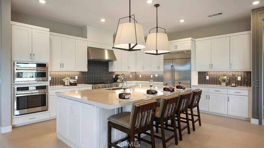 This expansive two-story home offers plenty of space with a total of 4 bedrooms with one of the bedrooms located downstairs with its own private bathroom. The first floor also offers flex space. The rest of the first floor features an open layout from the modern kitchen that offers white cabinetry throughout, massive walk in pantry.  The family room opens to a covered California Room ideal for indoor-outdoor living.   The second floor hosts a laundry room along with three more bedrooms and a bonus room. The luxe owner's suite has a large walk in closet.