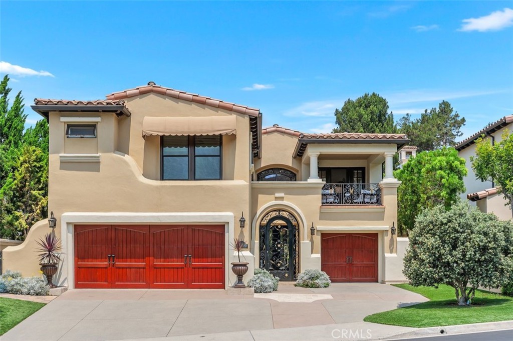 Beautiful Golf course Hill view home located on the 13th Fairway in the prestigious Marbella Country Club community. This Mediterranean-inspired golf course estate offers 3 bedrooms+Library/Den, 3 bathrooms. Approximately 3,300 square feet of elegantly appointed living space. This home has sweeping views of the manicured fairways and hills. This home is designed to celebrate seamless indoor-outdoor living. The spacious backyard features a built-in fireplace, BBQ, stone pavers, and multiple inviting seating areas—ideal for both relaxed lounging and upscale entertaining.
Inside, soaring vaulted ceilings and abundant natural light create an airy, sophisticated ambiance. Formal living room with fireplace and Dining Room. The chef's kitchen is equipped with high-end appliances and opens to view the Family room and country kitchen, perfect for everyday comfort and gatherings alike. A versatile library/den offers space for a home office, gym, or guest retreat. The spacious private primary suite serves as a serene escape, with luxurious finishes and tranquil views. Two primary master baths, a walk-in closet. Laundry room, central vacuum, water softener system, 3-car garage.
All of this is complemented by Marbella’s coveted lifestyle. Private membership available to purchase separately, including golf, tennis, pool, gym, clubhouse, and more—making this an exceptional opportunity in one of San Juan Capistrano’s most desirable enclaves.