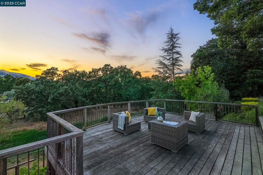 Open: Thurs 10-12, Sat 1-3, Sun 12-2! Modern, Single Story Masterpiece with Infinity Edge Pool in Danville’s Coveted Camino Verde Neighborhood. Welcome to a rare, single-story showstopper which backs to the creek below, and is nestled in one of Danville’s most sought-after neighborhoods. This amazing home boasts breathtaking sunset views. Step through the front door and prepare to be wowed: a gorgeous view of the hills, stunning sunset views & sunlit interiors set the tone for sophisticated living. At the heart of the home is a chef’s dream kitchen: a sleek, custom culinary space outfitted with top-of-the-line appliances, a spacious pantry, generous prep zones, with an enormous island. There is a seamless indoor-outdoor lifestyle and an entertainer’s paradise. Outside, the backyard stuns with a resort-style infinity edge pool with waterfall, outdoor kitchen, cozy fireplace & multiple relaxation zones perfect for sunset dinners or weekend gatherings. There is a detached outdoor office/flex space with electricity. The home’s atrium invites natural light year-round, enhancing peace & tranquility. Owned Solar Panels for low PG&E bills.