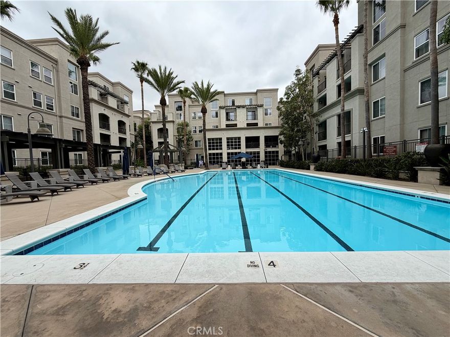 LUXURY LIVING AT AVENUE ONE IN IRVINE!

Step into resort-style living with this spacious ground-floor end unit, offering 1 large bedroom, 1 upgraded bath, and only one shared wall for enhanced privacy. The open concept design features a modern kitchen with granite countertops, luxury vinyl plank flooring, gas range, newer microwave, dishwasher, refrigerator, under-cabinet lighting, and in-unit stackable washer & dryer. The bathroom has been refreshed with a brand-new glass shower door, new toilet, new sink, granite counters, and abundant storage.

Relax in the inviting living area that flows seamlessly to a private patio surrounded by towering palms and bird of paradise landscaping, creating a tranquil, tropical atmosphere.

Avenue One delivers the ultimate amenity package: Jr. Olympic-size pool, spa, fire pit, state-of-the-art fitness center with pool views, cabanas, BBQ areas, indoor half-court basketball, children’s playground, sundeck with lounge seating, lush landscaped grounds, EV car charging stations in guest parking, and a secure bike storage area.

Perfectly situated in Irvine’s vibrant Airport Area, this home is minutes from John Wayne Airport, UCI, Park Place Shopping Center, South Coast Plaza, Diamond Jamboree, The District at Tustin, Irvine Spectrum, Newport Beach, and world-class dining, shopping, and entertainment. Easy access to the 405, 55, and 73 freeways makes commuting a breeze.

This is your opportunity to lease a stylish, move-in ready condo in one of Irvine’s most desirable resort-style communities!