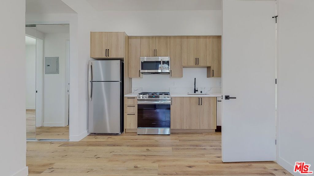 Photo of 4460 Maplewood Avenue #1/2, Los Angeles, CA 90004 (MLS # 25609111)