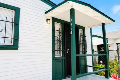 Photo of 228 W 70th Street, Los Angeles, CA 90003 (MLS # 26859635)