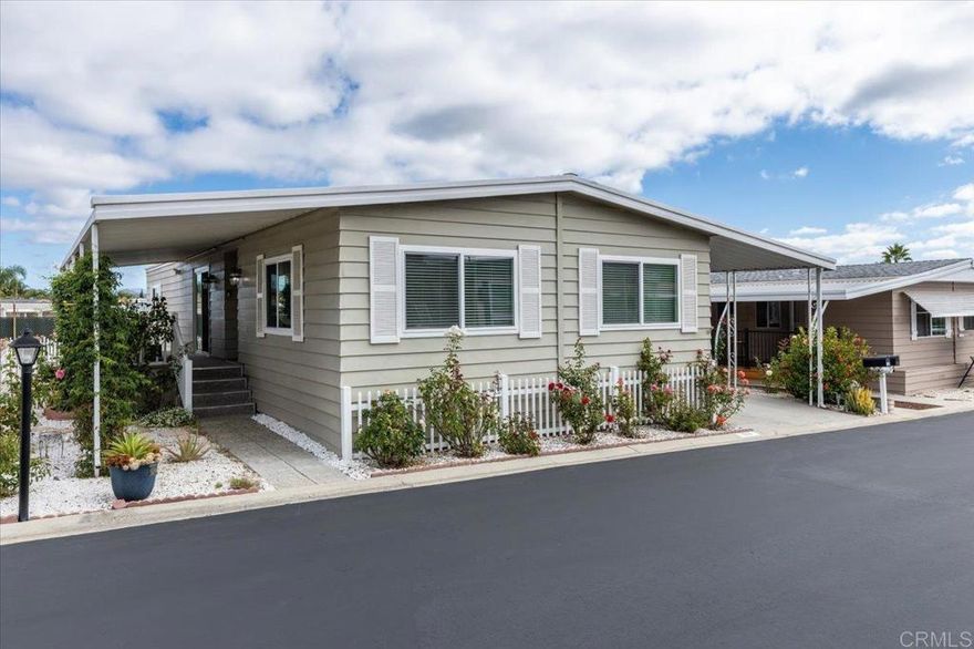 Lovely and unique remodeled 2 bed / 2 bath located in a 55+ rent controlled park with NO property taxes (home is still on HCD registration).  Tucked away on a cul-de-sac near the Tennis Courts and other amenities, this home boasts a remodeled Kitchen and Bathrooms, vaulted ceilings in the Living room and Dining room, dual pane windows, newer interior doors and fixtures, and a separate office space.  The Primary Suite boasts double sinks, a walk in closet, and a spacious custom step in shower.  The second Bedroom also has it's own ensuite Bathroom, which is convenient for guests or roommates.  The exterior offers a low maintenance yard, private covered porch, a covered carport that can fit multiple vehicles, and a storage shed.  Palomar Estates East is a very active and social 5* community - check out the photos to see some of the amenities this community has to offer!  Convenient to shopping, restaurants, Lake San Marcos, two golf courses at Lake San Marcos, another golf course nearby off Twin Oaks, entertainment, lots of parks and trails, the San Marcos Senior Center, and just a short 8 mile drive to Carlsbad beaches!  Monthly space rent is only $568.61 and is under rent control!