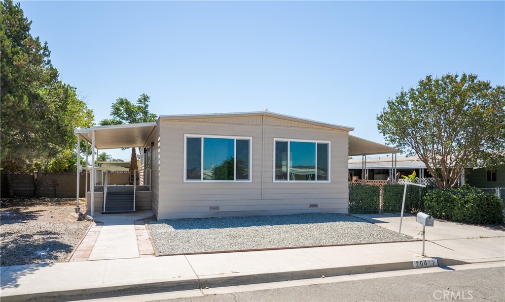 Welcome to 204 N La Paloma Ave, a fully updated home designed for comfort, convenience, and low-maintenance living in the peaceful 55+ community of Cottonwood Estates. With low HOA dues of just ~$50 per year and you own the land, this is senior living made simple. This move-in ready home has been thoughtfully remodeled with your lifestyle in mind featuring a brand-new kitchen with stainless steel appliances, easy-care waterproof laminate flooring, fresh paint, new dual-pane windows, a new roof, and a new HVAC system to keep you comfortable in every season. Tucked away in a quiet, well-kept neighborhood yet close to shopping, dining, and everyday essentials, this home offers the perfect blend of privacy and convenience. Enjoy the ease of single-level living, modern upgrades, and a welcoming community come experience Cottonwood Estates today. Please note: This home does not have a 433(a) permanent foundation certification.