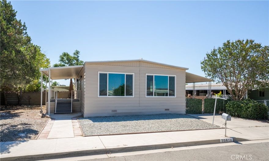 Welcome to 204 N La Paloma Ave, a fully updated home designed for comfort, convenience, and low-maintenance living in the peaceful 55+ community of Cottonwood Estates. With low HOA dues of just ~$50 per year and you own the land, this is senior living made simple. This move-in ready home has been thoughtfully remodeled with your lifestyle in mind featuring a brand-new kitchen with stainless steel appliances, easy-care waterproof laminate flooring, fresh paint, new dual-pane windows, a new roof, and a new HVAC system to keep you comfortable in every season. Tucked away in a quiet, well-kept neighborhood yet close to shopping, dining, and everyday essentials, this home offers the perfect blend of privacy and convenience. Enjoy the ease of single-level living, modern upgrades, and a welcoming community come experience Cottonwood Estates today. Please note: This home does not have a 433(a) permanent foundation certification.