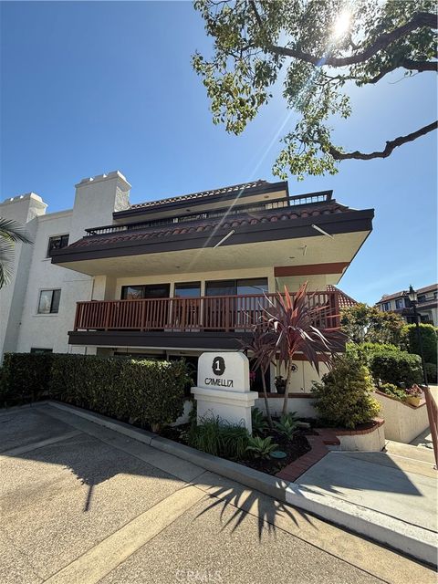 Photo of 6368 Riviera Cir, Long Beach, CA 90815 (MLS # DW26075998)