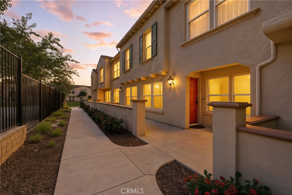 North Fontana Home in Gated Community Welcome to 7155 Citrus Ave #433, a beautiful home in one of North Fontana’s most desirable gated communities. Imagine a home that offers a white and bright, open floor plan with upgraded flooring and model home finishes. The modern kitchen features white cabinetry, quartz countertops, and stainless-steel appliances, flowing seamlessly into the dining and living areas perfect for entertaining. The main level also includes a stylish half bath and direct garage access. Upstairs, the spacious primary suite offers a walk-in closet, dual-sink vanity, and oversized shower. Two additional bedrooms, a full bath, and convenient upstairs laundry complete the layout. The gated community provides resort-style amenities including a sparkling pool, clubhouse, sport courts, parks, and walking paths. Conveniently located near Victoria Gardens, shopping, dining, and commuter routes. Solar panels add energy savings to this stunning home!
