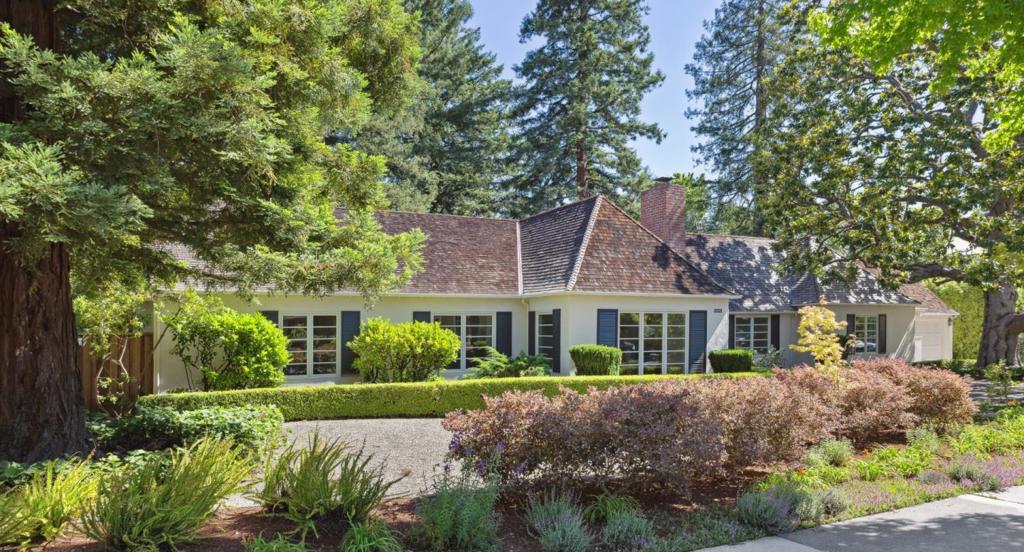 RARE OPPORTUNITY TO OWN ONE OF THE LARGEST PARCELS IN PRIME CRESCENT PARK Tucked into one of the most prized locations in Silicon Valley, this Crescent Park property offers an unparalleled blend of serenity, centrality, prestige and possibility. Grounds of nearly 0.5 acre form a private oasis around the residence, creating bountiful opportunities at a degree enjoyed by very few other homes in the vicinity. The expansive single-level layout is centered around a wide gallery lined with French doors, seamlessly blending indoor and outdoor living. The updated interiors feature spacious formal gathering rooms, a light-filled family room, a vast catering-grade kitchen, and an office/fifth bedroom. Three generously sized bedrooms, including the primary suite, are tucked away in a tranquil wing of the home. Unwind outdoors surrounded by mature professional landscaping, a bocce ball court, and pool with wet bar. Additional highlights include dual fireplaces and a whole-house attic - ideal for expansion. This home offers exceptional convenience to downtown amenities while maintaining tranquility and access to outstanding Palo Alto schools.