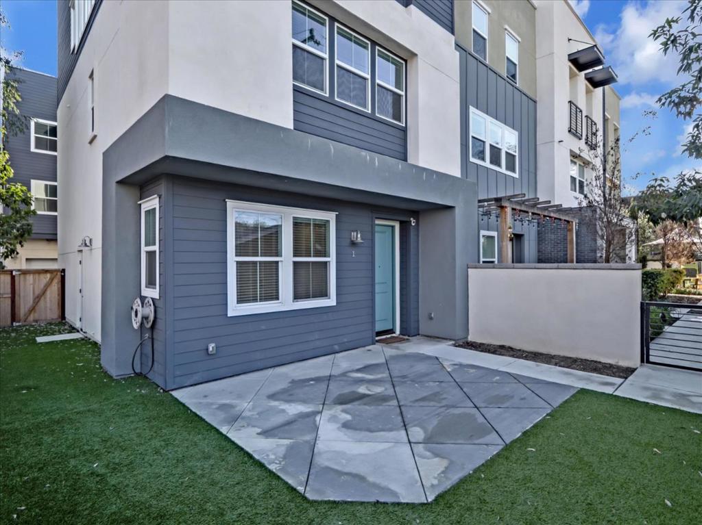 This 3-bedroom home in the best area of the Harbor Collection Community is ready for love! Unbeatable location - walk to the OC trolley, easy access to shops and restaurants, and moments to Downtown Santa Ana! This west-facing entertainers dream lets you enjoy indoor and outdoor living. Enjoy a large outdoor living area with stunning sunset views, a living room with direct access to the spacious garage, and a huge open floor plan with a private balcony on the upper level. Central air conditioning and smart thermostat installed, making this home comfortable all year. Prepare for feasts with ease with an open concept kitchen with its generous granite countertops, center island, and a walk-in pantry. Stainless steel appliances installed and ready to use. Good-sized bedrooms in plush carpeting, all fitted with roomy closets with sliding doors. The primary bedroom showcases a walk-in closet and a sleek 4-piece ensuite! Your new home comes with a 2-car garage, in-unit laundry, and solar panels to offset your electricity use! Close to Downtown Santa Ana, 4th Street Market, The Artist's Village, Newport Beach, and the best OC destinations. 10 minutes to Disney and Angel's Stadium/Honda Center! Pet Friendly Pet Deposit - $500