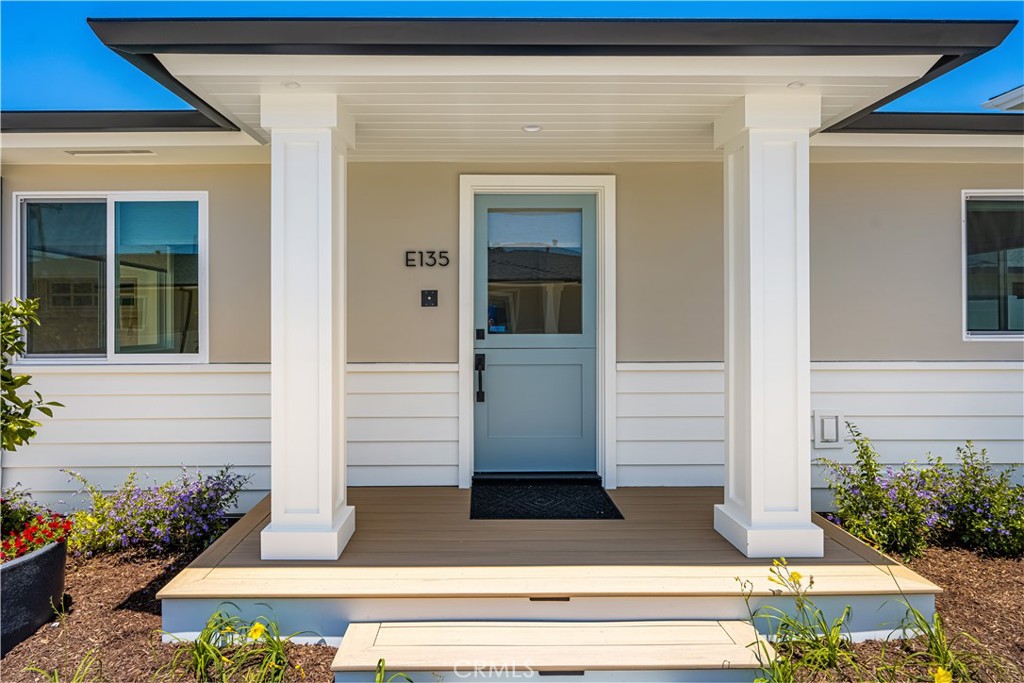 Welcome to Cottage E135 at The Hudson Cottages, located at 2134 Orange Avenue — an exclusive, newly built gated community in the heart of Eastside Costa Mesa, where elevated design meets effortless coastal living. This beautifully crafted 2-bedroom, 1-bath cottage offers approximately 950 square feet of thoughtfully designed space, blending warmth, high-end finishes, and everyday comfort. Every detail has been carefully curated — from the quartzite counters, custom cabinetry, handmade backsplash tiles and luxurious marble flooring to the new designer window coverings. The chef-inspired kitchen is a showstopper, featuring high-end fixtures, new appliances, and designer up-lighting for a modern, inviting ambiance. The bathroom also features elegant up-lighting, adding a touch of sophistication to the space. Function meets luxury with brand-new washer and dryer, pre-wired internet access, a dedicated data unit, USB-capable outlets, and smart-home readiness throughout. The property is equipped with a smart touchpad to open the community gate, plus an app-based system and garage controller that allow you to open your garage remotely. A private walk-through gate and a separate drive-through gate provide flexible entry options for added convenience. For added peace of mind, the cottages feature 24-hour exterior security cameras in the property’s common areas. Outdoors, you’ll enjoy both a private front yard and a spacious backyard, enclosed with privacy walls for relaxation, entertaining, or gardening in peace. Perfectly situated near the iconic Newport Beach, upscale restaurants, and scenic hiking trails at the Back Bay, this home offers a rare opportunity to live the SoCal lifestyle at its finest — whether you’re working remotely, hosting friends, or soaking up the coastal sunshine. Call for a tour today: 949-322-6404
