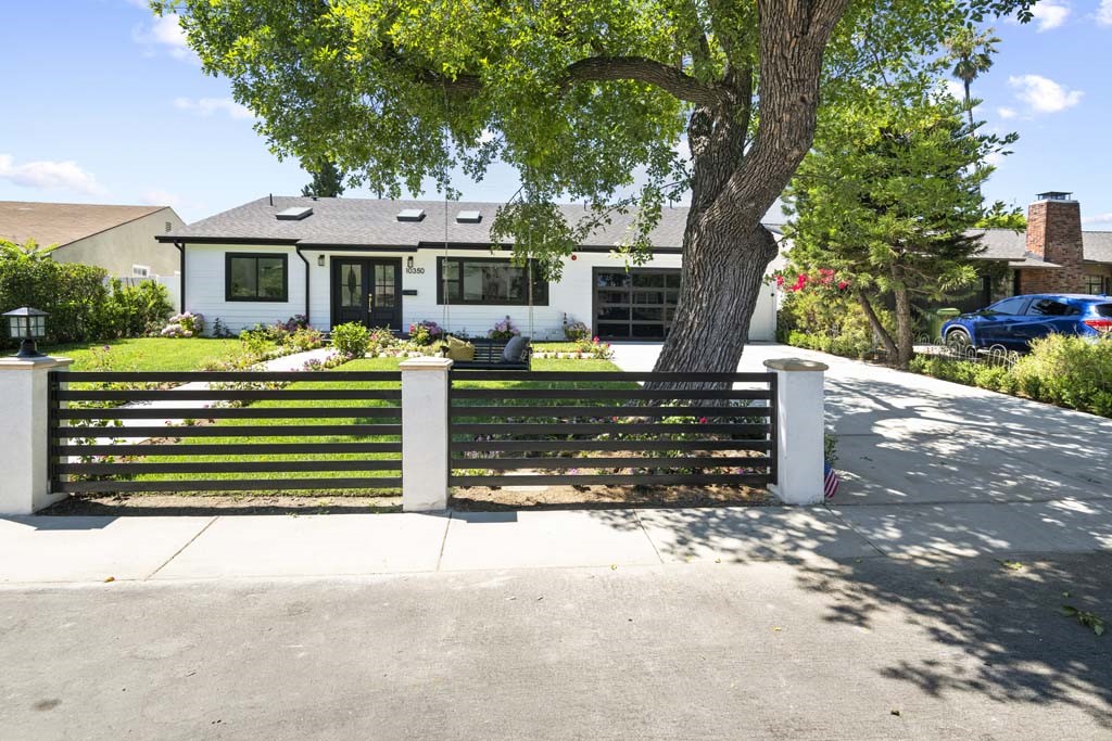 ***Significant Price Improvement*** in this exceptional, fully renovated masterpiece, nestled in the heart of highly sought-after **Toluca Terrace**. This expansive and beautifully designed home offers four spacious bedrooms, each featuring its own luxurious en-suite smart bathrooms, plus an elegant powder room for guests — a perfect blend of comfort, style, and functionality. This exceptional home is equipped with five state-of-the-art smart toilets, thoughtfully installed to elevate everyday comfort and hygiene, bringing a spa-like experience. Every inch of this home has been thoughtfully updated with high-end finishes and modern conveniences. Skylights throughout the home bathe the space in natural light, creating an airy, uplifting ambiance through all the open floor plan. No detail has been overlooked -from elegant fixtures to the added peace of mind provided by a built-in sprinkler system throughout the house, for enhanced safety. Step into a kitchen that effortlessly blends elegance with cozy charm, designed to inspire your inner chef. Warm tones, custom cabinetry, and soft under-cabinet lighting create an inviting atmosphere, while sleek quartz countertops and a spacious waterfall center island that comes with wine cooler and drawer microwave, offer both beauty and functionality. Situated on a massive lot, the backyard with its extensive deck offers endless possibilities. Whether you're entertaining or simply enjoying a peaceful evening at home, this residence delivers both luxury and practicality, in one of the Valley's most charming neighborhoods. "Don't miss this rare opportunity to own a move-in-ready gem, where sophisticated design meets exceptional potential”. Neither sellers or listing agent guarantee the accuracy of all details, buyers and agents are advised to verify all facts.