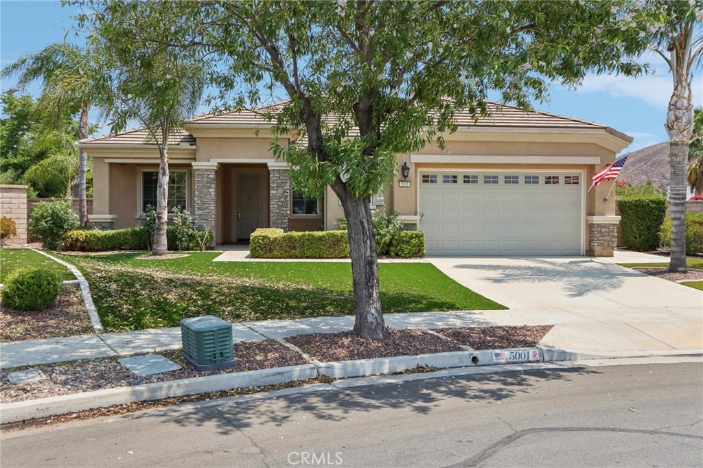 Welcome home to one of the most thoughtfully upgraded homes in the sought-after 55+ Solera Diamond Valley Community! This 2-bedroom, 2.5-bath residence offers 2,230 sq. ft. of beautifully designed living space, including a formal dining room and a versatile den/office. From the moment you arrive, the home makes a striking impression with its elegant rock pillar entry, front patio, and low-maintenance artificial turf landscaping. Step inside through a stylish front screen slider and find yourself surrounded by upgrades that elevate everyday living—plantation shutters, crown molding, tile flooring, and an open layout built for both comfort and entertaining. The chef’s kitchen is a dream, featuring an island, upgraded pendant lighting, breakfast nook, bar seating, and an abundance of cabinetry that makes storage a breeze. The family room is warm and inviting, centered around a cozy fireplace and built-in entertainment center. The den/office is a true retreat for productivity or creativity, complete with built-in desk, cabinets, and bookshelves. For ultimate privacy, the guest suite and the spacious primary suite are thoughtfully positioned on opposite sides of the home—each with its own dedicated hallway and full bath. The primary suite is a haven unto itself with a spacious bedroom, step-in shower, separate soaking tub, and a luxurious closet outfitted with custom built-in cabinetry and shelving. Function meets style in the laundry room, complete with sink and upper/lower cabinets, while the extended garage provides even more storage solutions with built-in cabinetry. Step into the backyard and discover your personal oasis—professionally landscaped with artificial turf, a serene fountain, built-in BBQ, and a California-style patio cover perfect for morning coffee or evening gatherings. Both side yards are accessible and add to the home’s appeal.