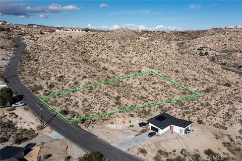 Photo of 57154 Buena Suerte Road, Yucca Valley, CA 92284 (MLS # JT25264313)