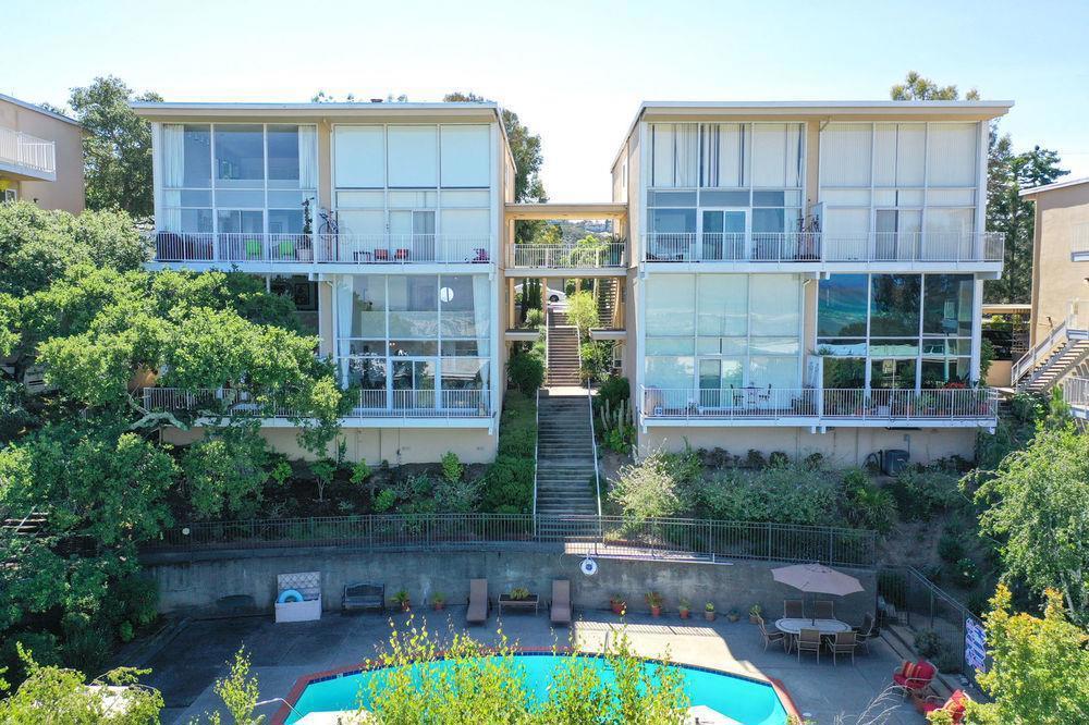 Rare find! Bright and spacious 2-bedroom, 1-bath apartment located in the peaceful San Carlos hills. Enjoy stunning views of the Bay from your private balcony in this well-maintained, lower-level unit. Features include: -2 large bedrooms with generous closet space -Updated bathroom with modern fixtures -Bright floor to ceiling 17-foot windows. -Open-concept living/dining area with natural light -Private balcony with sweeping Bay and city views -On-site laundry -Assigned carport parking + extra storage -Quiet, residential neighborhood Just minutes from downtown San Carlos, top-rated schools, parks, and convenient access to both Hwy 280 and 101. This is a perfect spot for those looking for comfort, views, and a great location on the Peninsula. 12+ month lease. $5,000/month. One month rent for security deposit. Owner pays water, sewer and garbage. One covered parking space. 1 pet allowed (including cats, small and large dogs). No smoking inside unit or on the premises. This is a lower unit and has a unit above. There are stairs inside and outside of unit.
