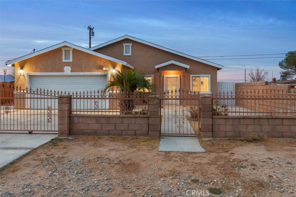 Welcome to 7673 Quezon Avenue, a spacious and stylish single-family home in California City offering 3 bedrooms, 2 bathrooms, and 1,911 sq ft of living space on a 7,405 sq ft lot.
Freshly updated throughout, this newer-built home features fresh interior paint in the living room, kitchen, and all bedrooms. Enjoy the comfort and efficiency of a new water heater, new AC capacitor & condenser, and new light fixtures throughout.
The large open floor plan is perfect for modern living. The primary suite includes dual sinks, a separate soaking tub, a walk-in shower, and a walk-in closet. The kitchen is a chef's delight, featuring stainless steel appliances, granite countertops, plenty of cabinets for storage, and recessed lighting. Additional highlights include tile flooring throughout, carpet in the bedrooms, crown molding throughout, ceiling fans, and recessed lighting in the living areas and kitchen.
The attached 2-car garage offers ample storage, while RV parking and access provide flexibility for all your needs.
Outdoors, you'll love the fully fenced yard for privacy, a covered patio ideal for entertaining, and beautiful mountain views. With easy access to the freeway and desert, this home blends peace, space, and convenience.