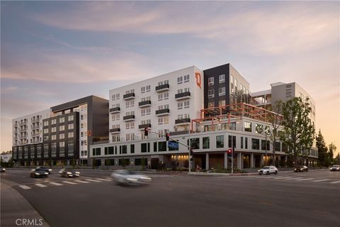 Photo of 21010 Erwin Street #PH745, Woodland Hills, CA 91367 (MLS # SR26049844)