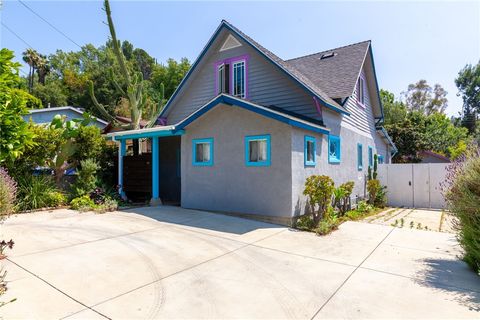 Photo of 712 S Avenue 60, Los Angeles, CA 90042 (MLS # SR26100631)