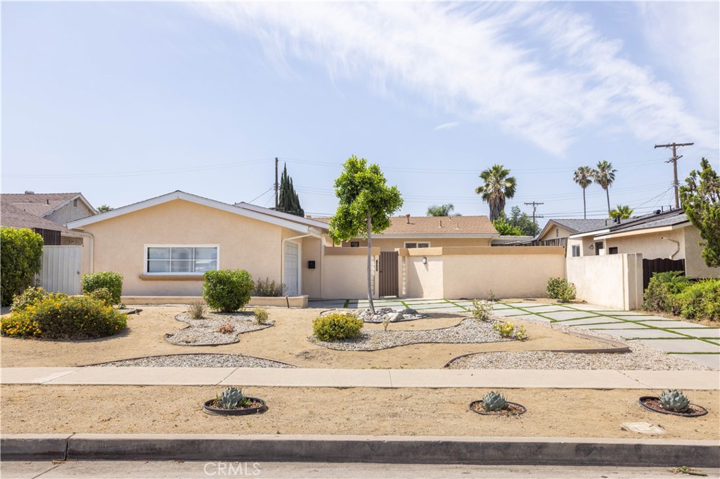This beautiful home is nestled on a picturesque street in one of Mission Hills’ most sought-after neighborhoods, and as soon as you lay your eyes on it you’ll immediately recognize the owner’s true “Pride-Of-Ownership.” Here are just a few of its many other fine features: * Its low maintenance drought tolerant landscaping, enclosed gated front courtyard, and sectioned concrete driveway enhance its eye-catching curb appeal * The custom front door with glass block side panel swings open to a flowing 1,312 square foot home that is in “Move-In-Condition” with recessed lighting, striking architectural accents, and an aesthetic blend of easy care laminate and tile flooring * The spacious living room is bathed in natural light from the double French door with side panels that opens to the covered entertainer’s patio, and has a mantled gas-burning fireplace with custom finished hearth * The family’s cook is going to truly appreciate the kitchen’s abundant cabinets, granite counters with full back-splash, durable dual basin stainless steel sink, built-in stainless steel appliances, breakfast alcove, and the convenience of the adjoining dining area * Functionally located laundry room * All 3 bedrooms have large closets * A total of 2 bathrooms * The energy efficient dual pane windows will help keep your utility bills low and the interior very quiet * Central air and heating for year-round comfort * Copper plumbing * You’re going to appreciate and enjoy the “Park-Like” backyard’s privacy fencing, covered entertainer’s brick patio, open concrete patio, and manicured landscaping * Plenty of secure off street parking on the oversized concrete driveway and in the attached 2 car garage * All of this sits on a large 7,757 square foot lot that’s close to several landmark restaurants, shopping, the 118, 5 and 405 freeways, plus it’s close distance to the Olivo at Mission Hills Plaza with its shopping, restaurants, banking, and 24hr Fitness Gym