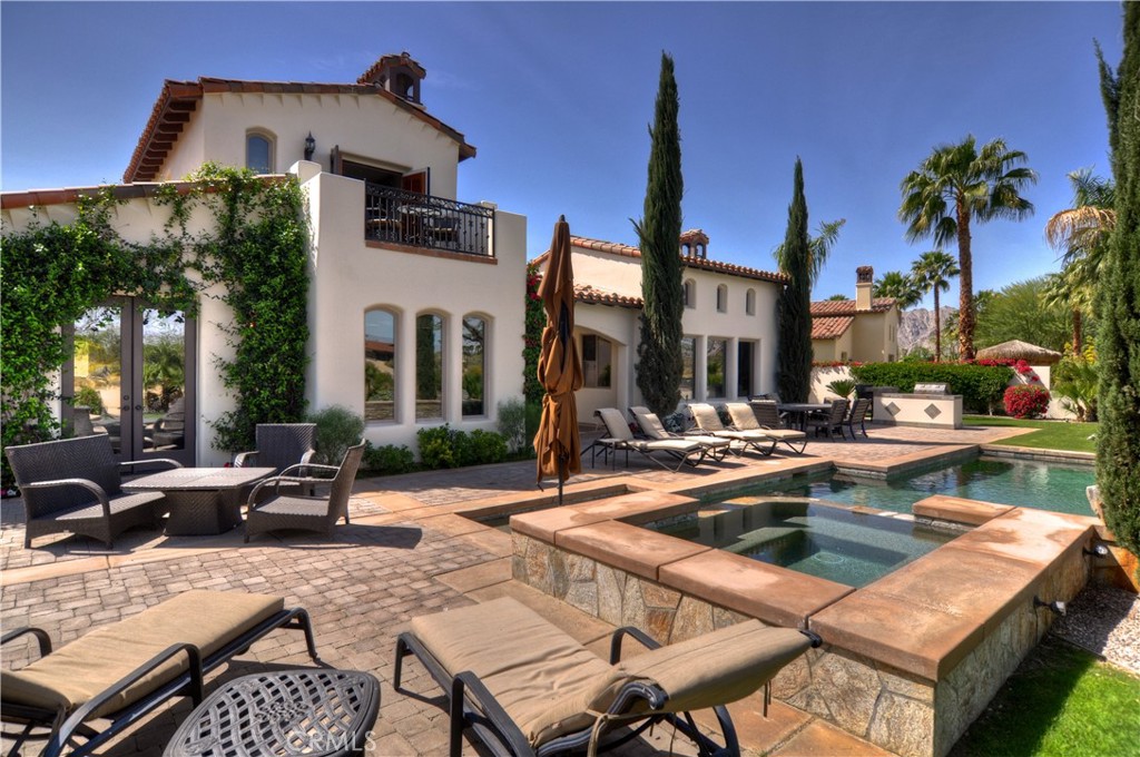 Stunning Lakefront Estate on the Greg Norman Course!
This beautifully appointed Plan IV home offers approximately 4,000 sq ft of refined living space, featuring 5 bedrooms and 5.5 baths, including an attached casita and an enclosed upstairs bedroom with a sky deck. Designed with casual elegance and ideal for entertaining, the open-concept great room seamlessly connects to a chef’s kitchen complete with granite countertops, custom range hood, and full backsplash. Step outside to a backyard oasis with a sparkling Pebble Tec saltwater pool and spa, cascading waterfall, built-in BBQ island, and generous patio space—perfect for outdoor gatherings. A rare opportunity to own a premium golf course and lakefront property! Information provided is deemed reliable but is not guaranteed and should be independently verified. Buyer and Buyers agent are responsible for verifying all aspects of the property, including but not limited to square footage, lot size, boundaries, permits, usage, and condition to their own satisfaction.
Seller is the listing agent and a licensed California Real Estate Agent. Call for showing. Sold Fully Furnished