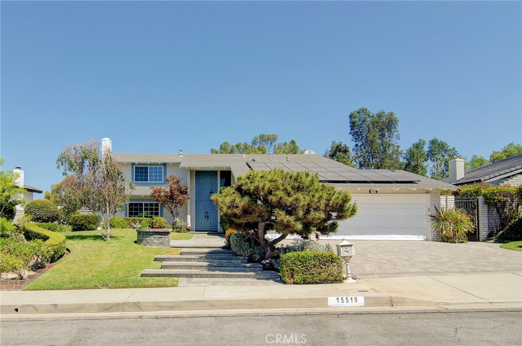 Fantastic purchase opportunity on this absolutely gorgeous pool home located in the coveted "Friendly Hills" community. Paid off solar for energy savings. Desirable floor plan with 1 bedroom & 1 bath downstairs, 3 bedrooms & 2 bathrooms upstairs, and a highly upgraded chef's kitchen with center island and a garden window view of the beautiful and serene backyard. Wonderful curb appeal with mature landscaping and concrete paver walkway, 2-story entrance, hardwood floors though the entry, kitchen and the dining room, formal living room with fireplace, oversized window framing the view to the front yard, custom carpet, formal dining room with sliding glass doors leading to the backyard, detailed customization in crown moldings & baseboards, spacious & bright chef's kitchen with granite center island, custom tray ceiling over the island, built-in appliances, abundant picture windows with unobstructed horizontal view of the entire backyard, separate family room with fireplace, built-in cabinets, crown molding and 4-panels of French doors with views of the backyard, one bedroom downstairs (currently being used as an office) with French door & side lites, and 1 bath downstairs, huge primary suite with walk-in closet, primary bath with custom gtray ceiling, separated dual sink vanities, mirrored closet doors and walk-in shower, nice size bedrooms, updated upstairs hallway bathroom with dual sink vanities, tub & frameless shower door, custom stairs railing and runner carpet, forced air heating and central air conditioning, dual pane windows and doors (with excepltion of the family room), recessed lights throughout the home, covered patio with brick pavers, sparkling salt water pool, huge backyard with firepit, built-in BBQ, and mature trees for serene enjoyment and entertaining, 3 car attached garage with laundry area, lots of built-in storage cabinets and automatic overhead door opener. Don't miss out!