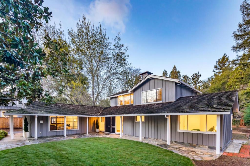 Set on an exceptional lot of over .6 acres (per survey) in sought-after Central Menlo, this 3-bedroom, 3-bathroom home of nearly 2,900 square feet offers a tranquil hideaway on a tree-lined, no-through street. Stylish mid-century modern design elements extend throughout, with beautiful walls of glass designed to take advantage of the home's park-like setting. Expansive spaces include the fireplace-centered living room, the office with great work-from-home space, and the bright dining room with backyard views. The stunning master suite, set beneath a soaring cathedral ceiling, includes access to the sprawling yard that envelops the property, featuring tall trees, a lawn, and ample patio space. This incredible location is mere moments to downtown Menlo Park, downtown Palo Alto, Stanford University, and Venture Capital centers along Sand Hill Road. Plus, acclaimed public and private schools are close at hand.