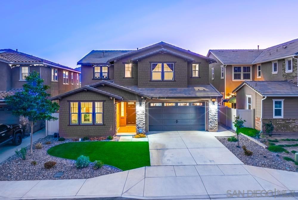 BEAUTIFUL VIEWS!!! Perched at the top of the hill in the Promontory neighborhood of Horse Creek Ridge, this 2021-built, 4-bed, 3.5-bath haven at 35828 Blue Breton Dr, Fallbrook, crowns sweeping sunset vistas and majestic mountain panoramas. Step into modern elegance with an expansive, light-filled open floor plan designed for connection, celebration, and cherished memories. This architectural gem blends luxury with effortless living, crafted for those who seek beauty in every detail. The main floor features a private bedroom with a full bath, ideal for guests or multi-generational living, plus two additional versatile rooms—envision a refined dining room, tranquil study, playful retreat, or extra bedroom to suit your lifestyle. Ascend to the upper floor where you will find a spacious loft, perfect for cozy movie nights or lively game sessions, with a conveniently placed laundry room nearby. Lustrous laminate wood floors flow throughout, tying elegance to warmth. The chef’s kitchen, a culinary masterpiece, boasts a new double oven, instant hot water, and a grand island perfect for hosting unforgettable gatherings. Savor golden sunsets from the primary suite’s private balcony or unwind in the lush, turfed backyard, aglow with a fire pit and string lights for magical ambiance. Elevated by a 240-volt Tesla charger, solar panels, plantation shutters, phone-controlled smart outdoor lighting, a security system, tankless water heater, and dual-zoned A/C, this move-in-ready sanctuary offers unmatched sophistication and comfort, inviting you to live beautifully in every moment. The Promontory at Horse Creek Ridge community offers a wealth of amenities including its resort-style clubhouse, sparkling pools, soothing spas, playgrounds for the kiddos, and lush parks. Perfectly positioned just 35 minutes from Marine Corps Base Camp Pendleton, 20 minutes from the vibrant Temecula wine country, and a mere 5-minute jaunt to the 15 freeway, this home offers the best of both worlds—peaceful retreat and timeless style! Discover your dream home, where every detail sparkles with possibility. Schedule your private tour today and let 35828 Blue Breton Dr steal your heart!