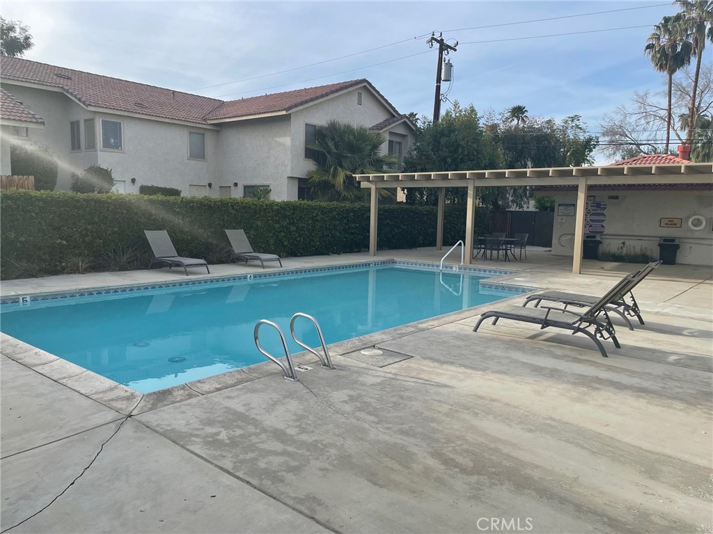 This 2 bed 1 bath 2 story townhouse is located in the Driftwood Oasis Complex and the entire building was recently renovated The exterior of the property was completely remodeled with new exterior paint , all new landscaping, remodeled pool area, , in unit full size washer dryer hookups and upgraded Air Conditioning and new windows. The parking are and driveway were resurfaced, new exterior lighting and security camera system. The unit itself has just been completely renovated with all new appliances including refrigerator, microwave, stove and dishwasher. Wood floors, new paint, new blinds and new hardware and ceiling fans. Unit is available for immediate move in for a yearly lease or longer. Complex has a gated swimming pool just next door and unit has attached 2 care garage with full size washer dryer hook ups.
