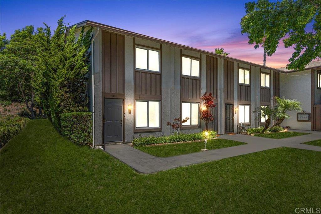 Welcome to your private retreat in San Carlos, just steps from Mission Trails. This ground-floor corner condo has been thoughtfully updated, blending modern comfort with a lifestyle that feels connected to both nature and community. The kitchen features granite countertops, updated appliances, and plenty of cabinet space. Fresh paint, new flooring, and split A/C units in every room create a clean and inviting atmosphere. The spacious living area opens to your private backyard patio with low-maintenance turf and direct access to the greenway — a rare feature perfect for morning coffee, evening relaxation, or entertaining friends. Practical upgrades include a new water heater, two dedicated carport spaces, and community laundry located in the garage right outside your door, shared with only four other units. The community itself offers resort-style amenities, including a gated pool, playground, basketball court, and recreation area ideal for barbecues and gatherings. Tucked away from main streets, the neighborhood is peaceful and quiet while keeping you close to shopping, dining, schools, and some of the best hiking in San Diego. This San Carlos gem is move-in ready, meticulously maintained, and offers the perfect balance of modern living and outdoor lifestyle.